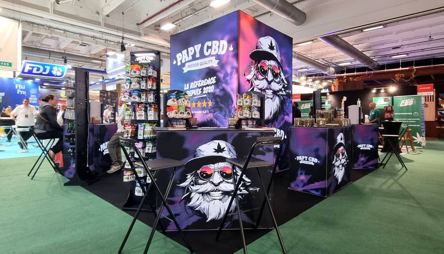 Salon Losangexpo 2025 - Stand PAPY CBD avec comptoirs lumineux et présentoirs de produits CBD