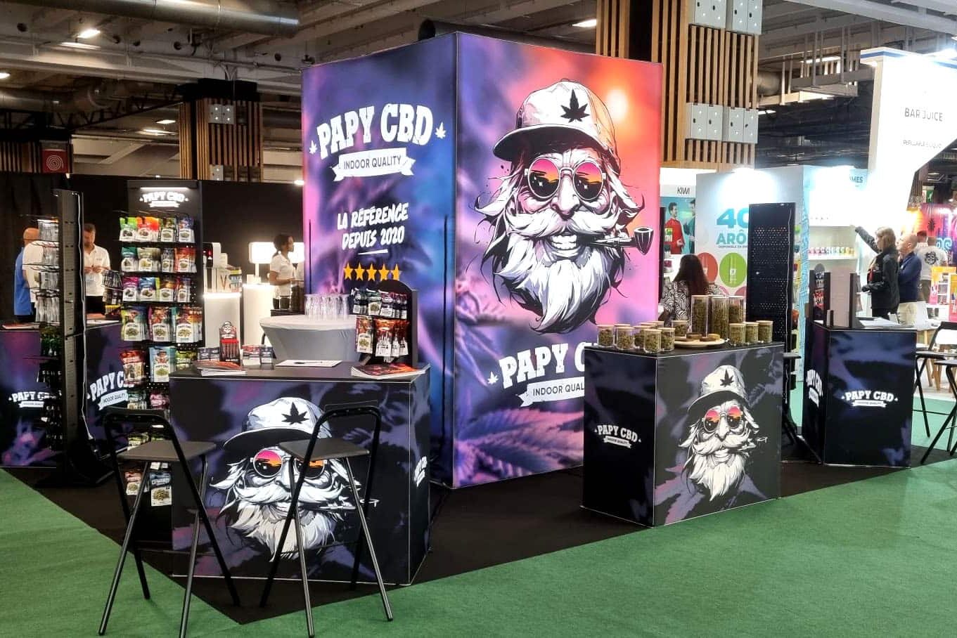 Salon Losangexpo 2025 - Stand PAPY CBD avec comptoirs lumineux et présentoirs de produits CBD